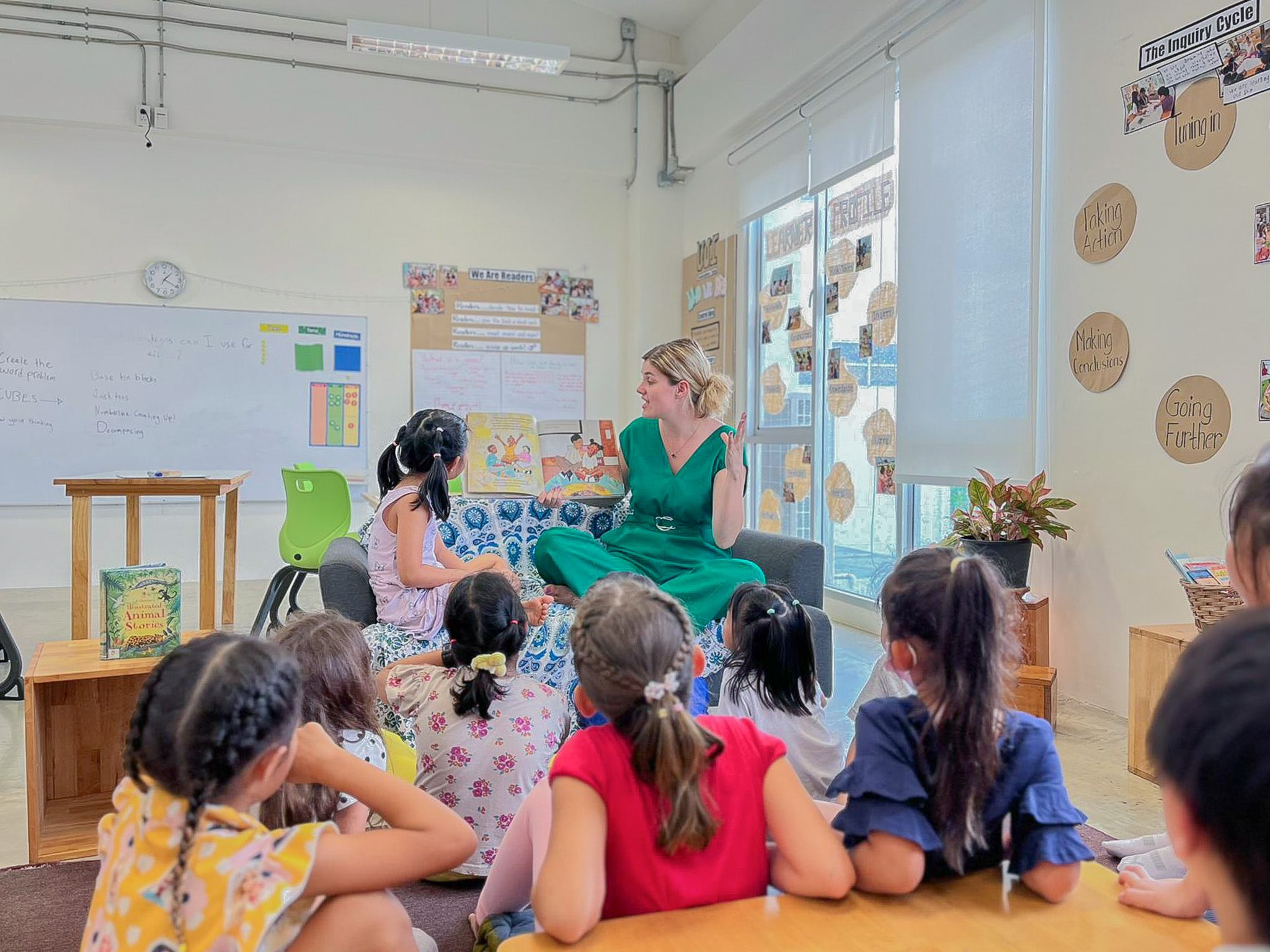 Students in classroom listening and looking at the teacher